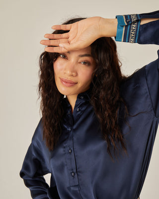 Blusa oversize con cuello y manga larga