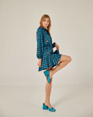 Vestido corto camisero con volantes