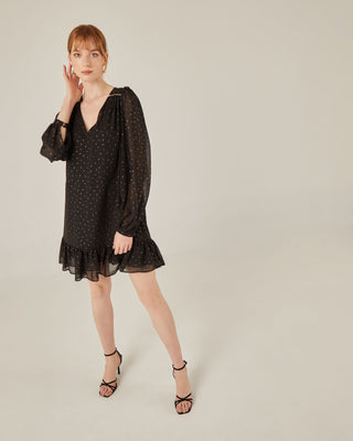 Vestido corto con volante y goma metálica lurex