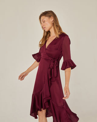 Vestido midi cruzado con volante