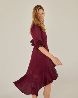Vestido midi cruzado con volante