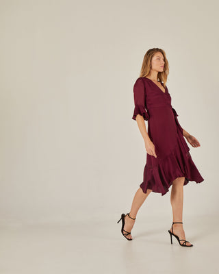 Vestido midi cruzado con volante