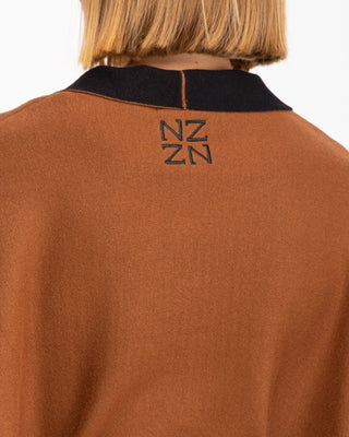 Jersey tipo poncho cruzado bicolor