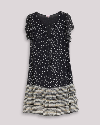 Vestido corto volantes y estampados combinados