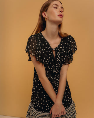 Vestido corto volantes y estampados combinados