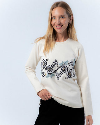 Camiseta blanca con bordada de flores 