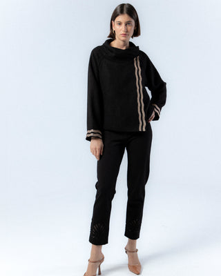 Jersey negro con detalles dorados