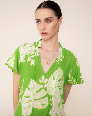 Foto representativa de vestido corto verde lima tropic