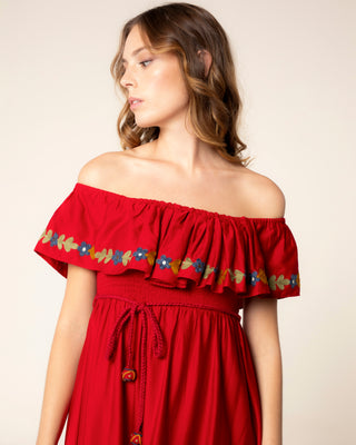 Fotografía destacada de vestido estampado rojo escote bardot creta