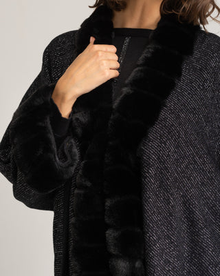 Poncho con ribete negro Loren