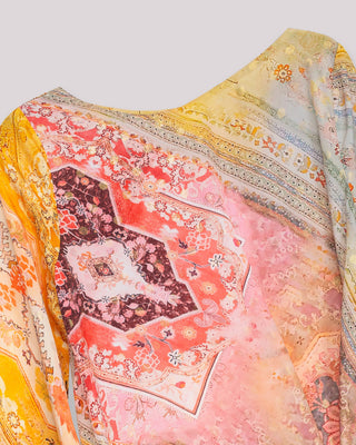 Blusa estampada con lazada lateral asimétrica Sahara