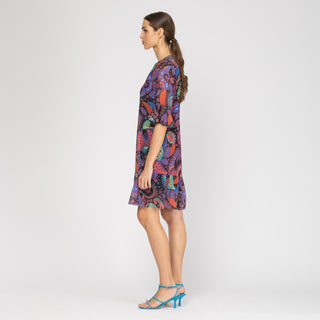 Vestido corto y relajado con plisado