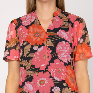 Vestido corto estampado con volantes negro