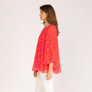 Blusa evasé con mangas plisadas