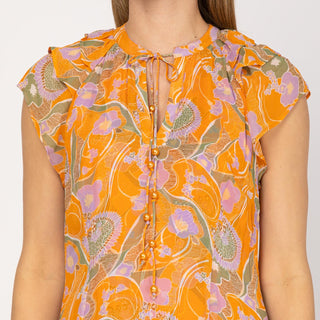 Vestido corto estampado con volantes