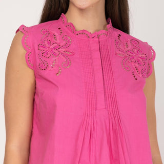 Blusa evasé con bordado rosa